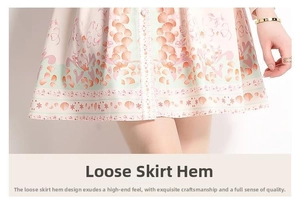 Close-up of lightweight chiffon dress hem with orange shell and tropical floral prints