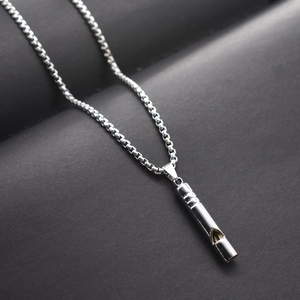 Silver whistle pendant necklace on box chain with sleek metallic finish for street style