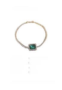 Detail of emerald geometric rhinestone bracelet in gold alloy with 21cm size label