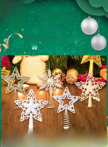 Close-up of hollow glittery Christmas tree toppers set including stars and snowflake