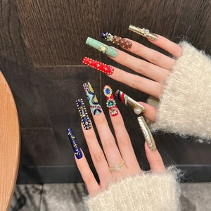Luxury long handmade press-on nails with 3D metallic charms and crystals