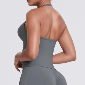 Deep grey halter sports bra and high-waist leggings set showing open back detail