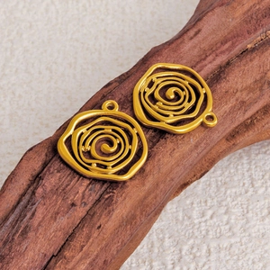 Irregular hexagon gold stainless steel pendants with spiral texture on a branch