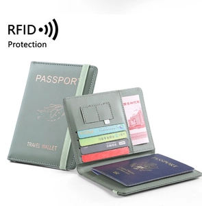 Sage green PU leather RFID passport holder with multiple card slots and travel wallet details