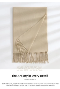 Close-up of soft cashmere-feel scarf with delicate tassel fringe in light camel