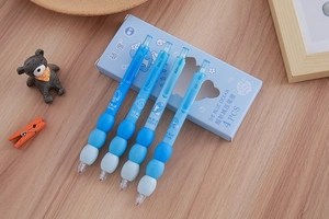 Close-up of blue ocean themed retractable pens with ergonomic soft grip and quick-dry ink