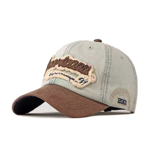 Vintage washed baseball cap in grey green with brown brim and American style embroidery