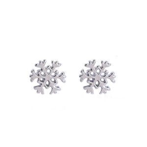Detailed close-up of silver snowflake stud earrings with elegant minimalist metal design