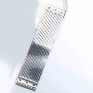 Detailed view of silver metallic belt featuring vertical stripes and rivet accents
