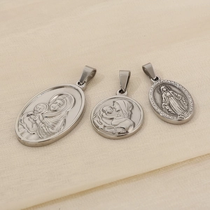 Three-piece silver stainless steel religious pendants featuring Virgin Mary relief on linen