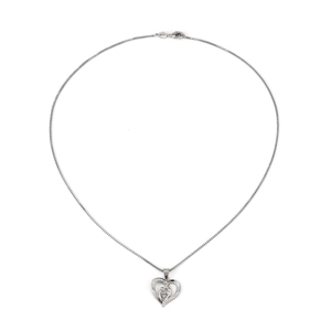 Close-up of silver box chain necklace with heart-shaped mother and child pendant