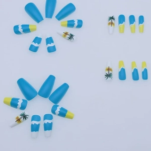 Blue and yellow beach holiday press-on nails with palm tree and sunset nail art design