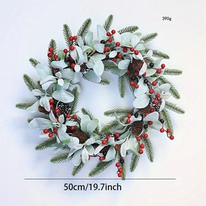 Detailed view of a 50cm Christmas wreath with pine cones and red berries on white background