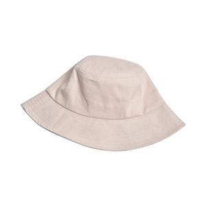Close-up of high-quality cotton twill texture and stitching on the beige bucket hat brim