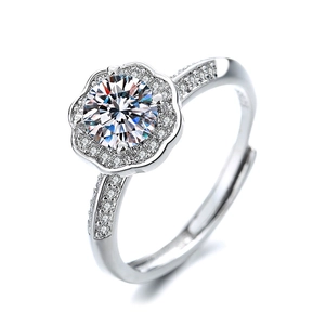 Elegant floral moissanite ring with adjustable silver band and sparkling gemstones