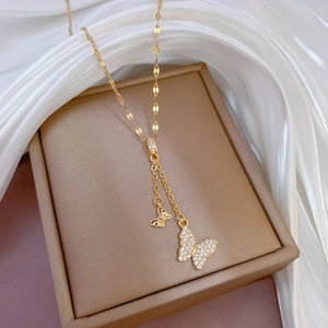 Exquisite gold-plated butterfly necklace with micro-pave crystals on silk jewelry box