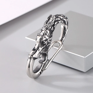 Macro shot of retro stainless steel dragon head clasp with detailed metal textures