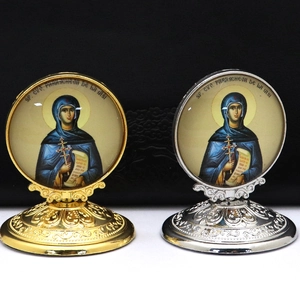 Religious saint icon desk ornaments in gold and silver finish with embossed bases