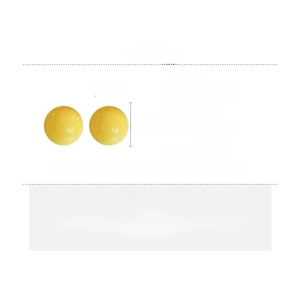Detail view of yellow candy ball earrings showing 2.1cm size and acrylic material texture