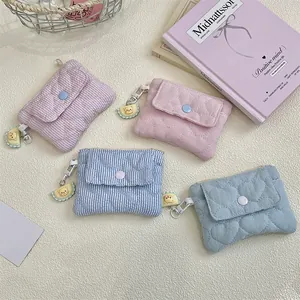 Quilted pastel coin purses with cute bear charms in stripe and heart patterns