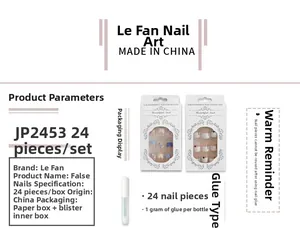 Detail view of French white press-on nail set with 3D floral designs and 24 pieces