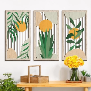 Bohemian wood wall art set with tropical leaves and geometric sun in light wood frames