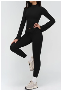 Side view of black women's yoga set with stand collar zipper jacket and high waist leggings