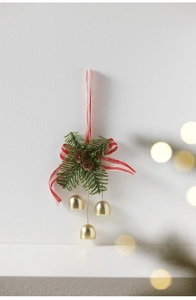 Detail of Christmas wreath pendant with golden bells, pine cones and striped ribbon bow