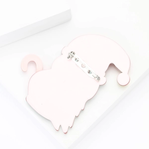 Detail of acrylic Santa Claus brooch back featuring a secure silver metal safety pin
