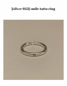 Macro detail of 925 sterling silver smile ring with adjustable open band design