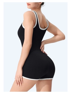 Detailed back view of ribbed athletic romper with white contrast trim and U-neckline