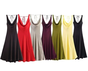 Detail of cowl neck midi dress in seven silk satin colors showing glossy fabric texture