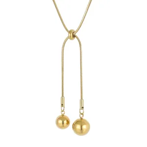 Adjustable gold snake chain necklace with dual polished bead pendants in stainless steel