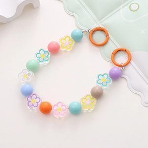 Colorful acrylic macaron bead chain with flower charms and orange spring rings