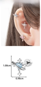 Macro detail of heart zircon Saturn earrings with precise dimensions and ear lobe fit