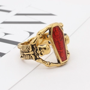 Gothic skull coffin ring in vintage gold with red enamel accents for men