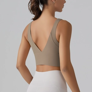 Macro view of khaki sports bra with deep V-back design and wide supportive elastic band