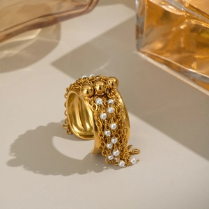 Golden statement ring with layered pearl tassels and beads in a vintage elegant design
