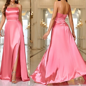 Detail of hot pink satin dress featuring high slit and elegant spaghetti straps