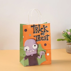 Orange Halloween zombie gift bag with Trick or Treat print and white rope handles