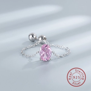 Detailed close-up of a 925 sterling silver chain ring with a pink oval zircon stone