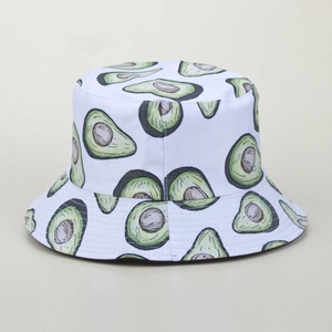 Close-up of white bucket hat featuring cute avocado prints and soft cotton texture