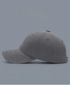 Close-up of dark grey cotton twill baseball cap with breathable vents and fine stitching