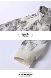 Detailansicht der Schulternähte und Rippbündchen am Sweatshirt mit Marmormuster