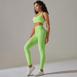 Neon green seamless yoga set with racerback sports bra and high-waisted leggings