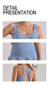 Detail of light blue sports dress featuring a U-neckline and overlapping waist pleats