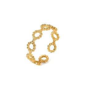 Detail of golden stainless steel open ring featuring a hollow wave-like circular link design