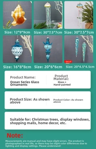 Detail of glass marine Christmas ornaments featuring hand-painted seashell and jellyfish shapes