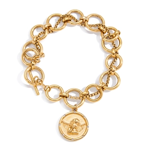 Detail of vintage gold titanium steel bracelet featuring a round angel relief coin pendant