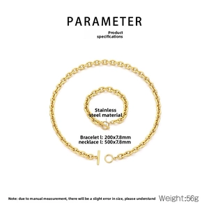 Detail view of gold-plated stainless steel necklace and bracelet set with OT toggle clasp
